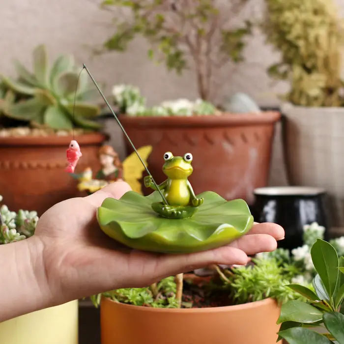Statue de grenouille flottante