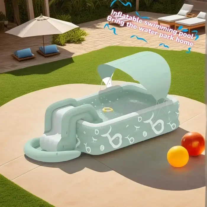 Grande piscine gonflable avec toboggan et abri