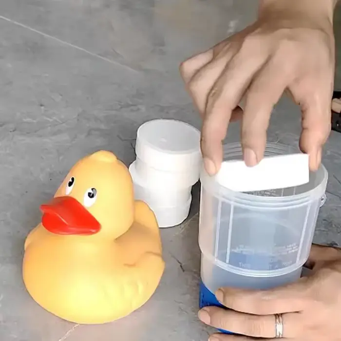 Distributeur de chlore flottant pour piscine (canard jaune)